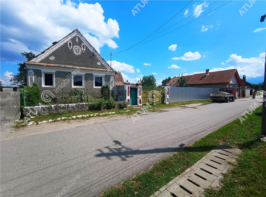 Casa cu 4 camere si 1650 mp teren la doar 30 km distanta de