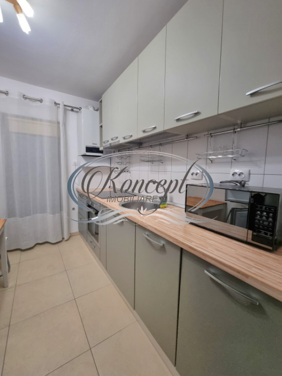 Apartament cu finisaje moderne, dressing si balcon in cartie