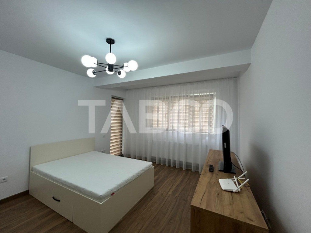 Garsoniera la prima inchiriere cu balcon gradina loc parcare