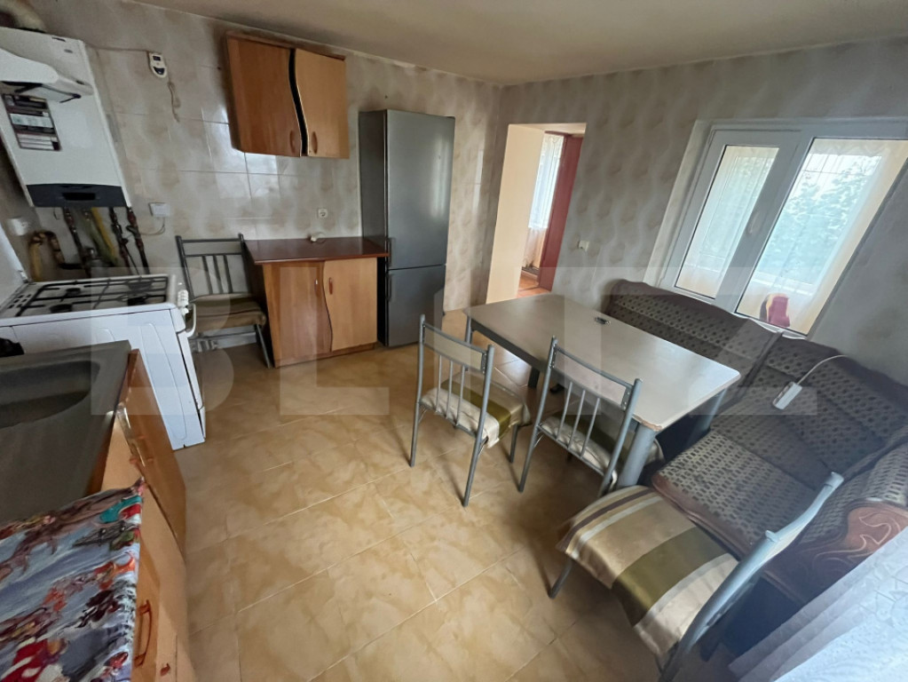 Casă 54 mp utili, mobilată și utilată complet, curte pro