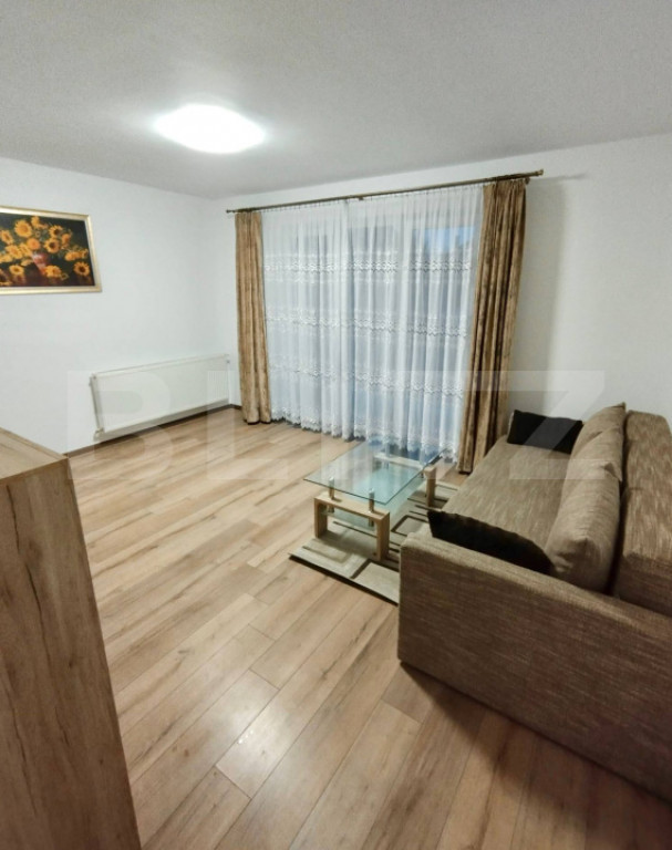 Apartament cu 2 camere, 49 mp + loc de parcare subteran, zon