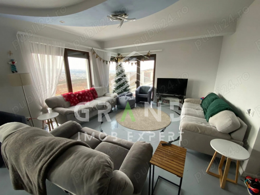 Casă elegantă de închiriat în Borhanci cu parcare si cur