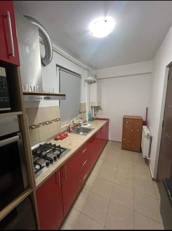 Garsoniera bine compartimentata cu balcon inchis, centrala termica