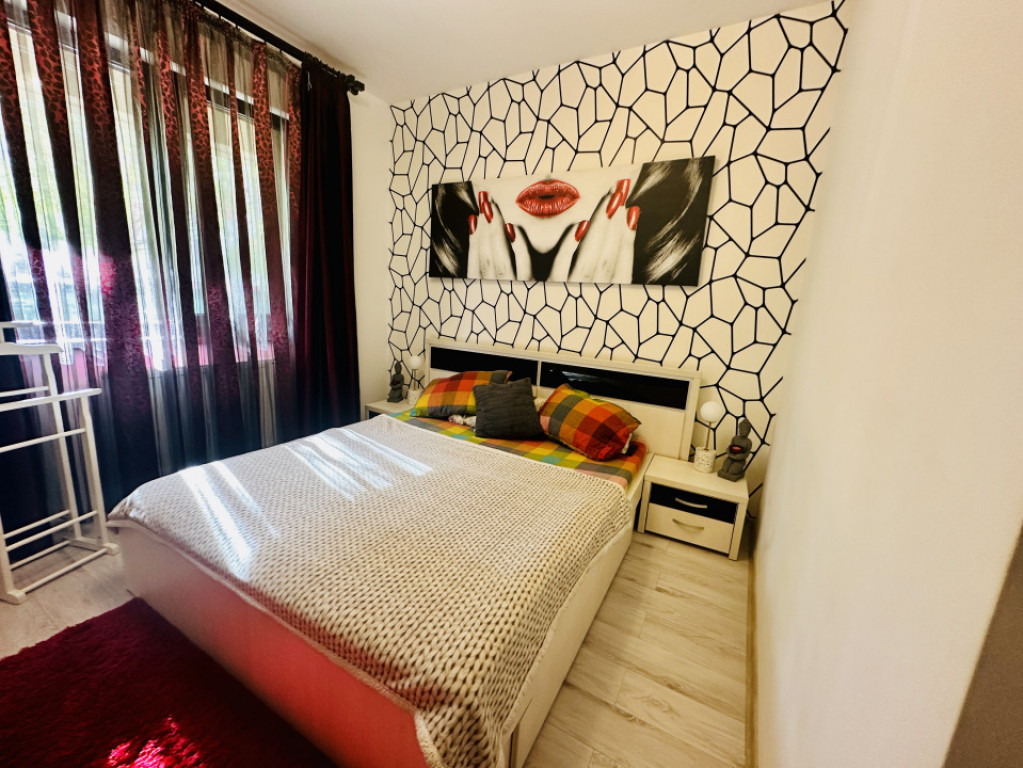 Apartament superb 2 camere cu loc de parcare inclus în pre?