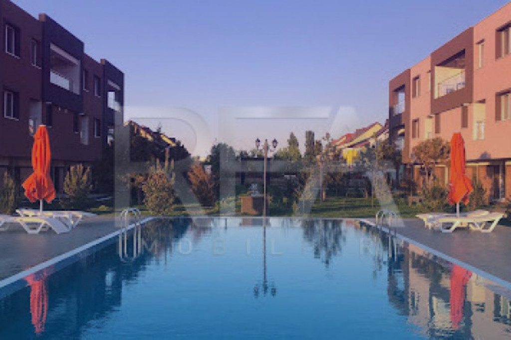 Apartament cu 2 camere, parcare privată și acces la piscin