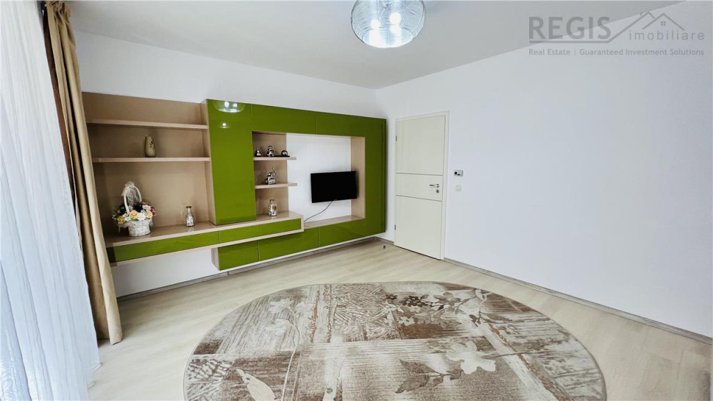 Apartament spatios de 2 camere cu gradina, parcare boxa