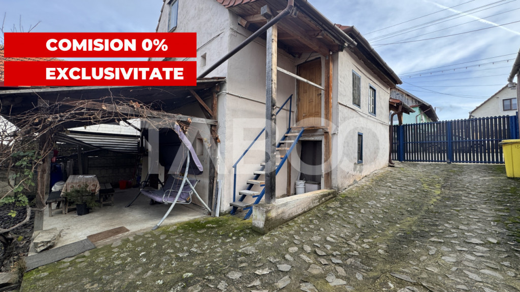 Casa de vanzare cu curte spatioasa loc relaxare si gradina C