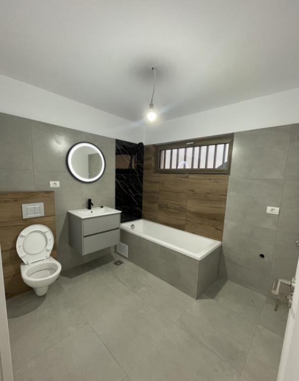 Apartamente 2 camere finalizate, cu grădină și parcare in