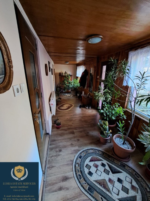 Casă formată din 2 clădiri P+M și P+1