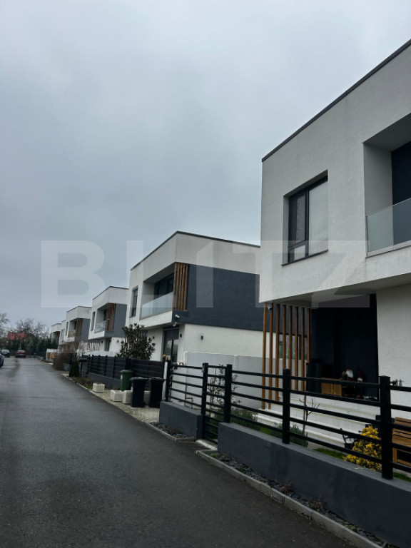 Casă premium cu 5 camere, grădină și terasă, complet mo