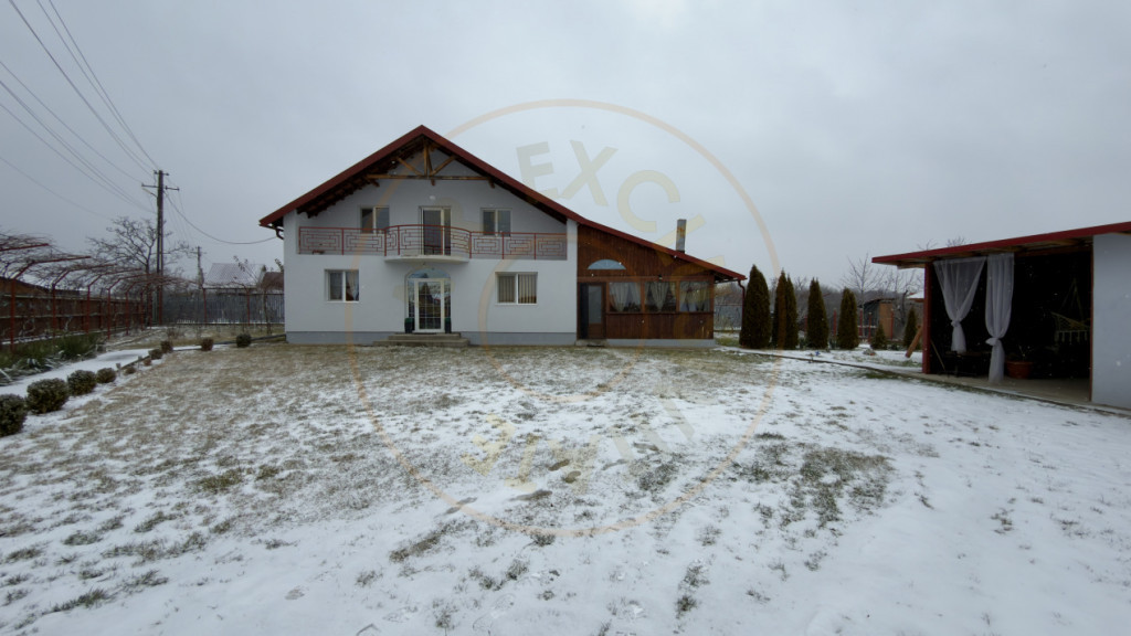 Casa cu teren generos si gradina spectaculoasa – Comuna Cu
