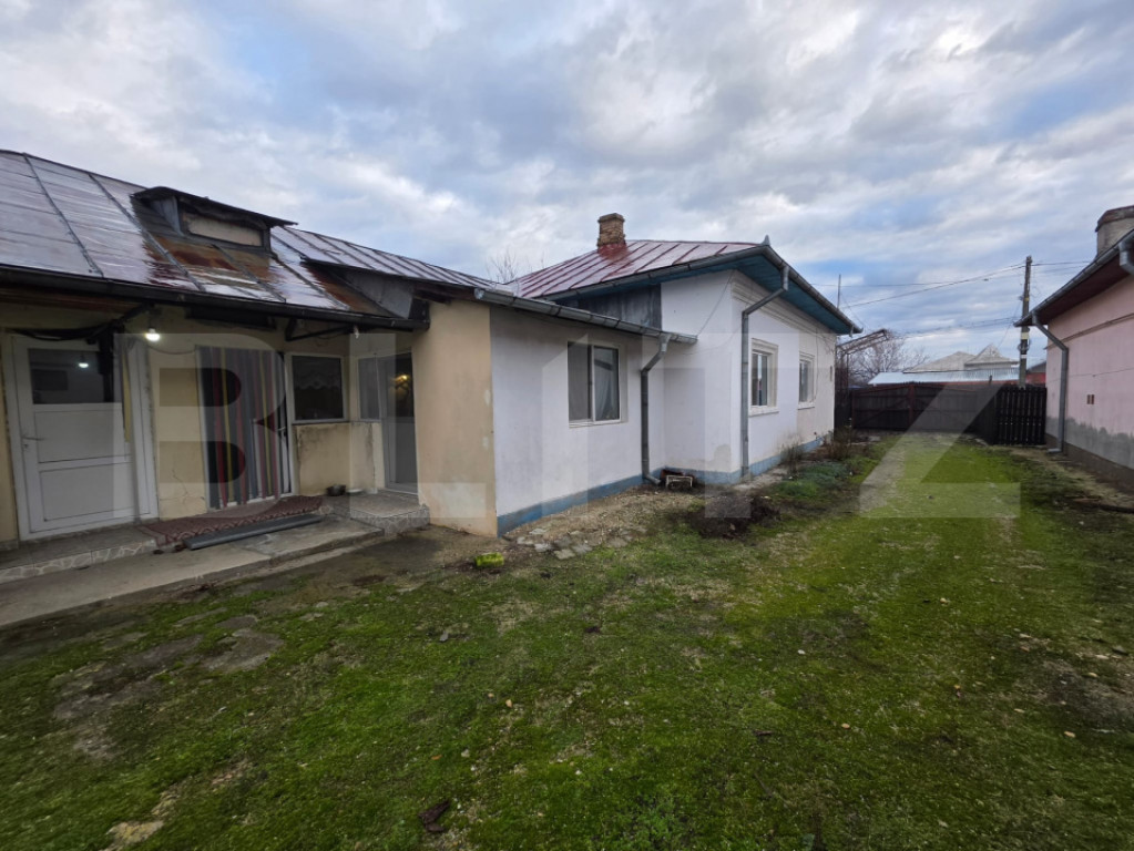 Casă cu teren generos și baltă de pescuit – Găești