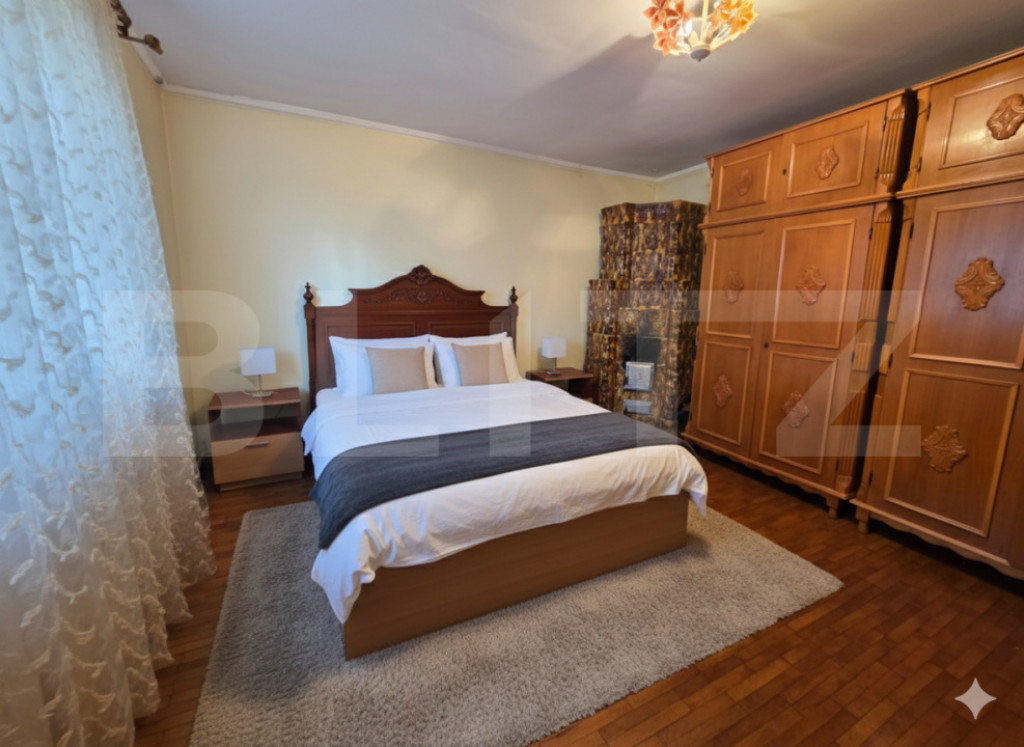 Casă cu teren generos și baltă de pescuit – Găești