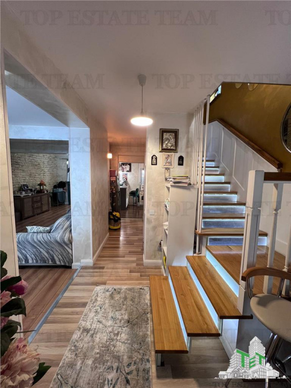 Vila individuala cuplata 4 camere S P 1 M, cu incalzire in p