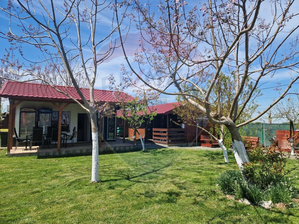 Afacere la cheie – Complex turistic cu 21 de căsuțe d...