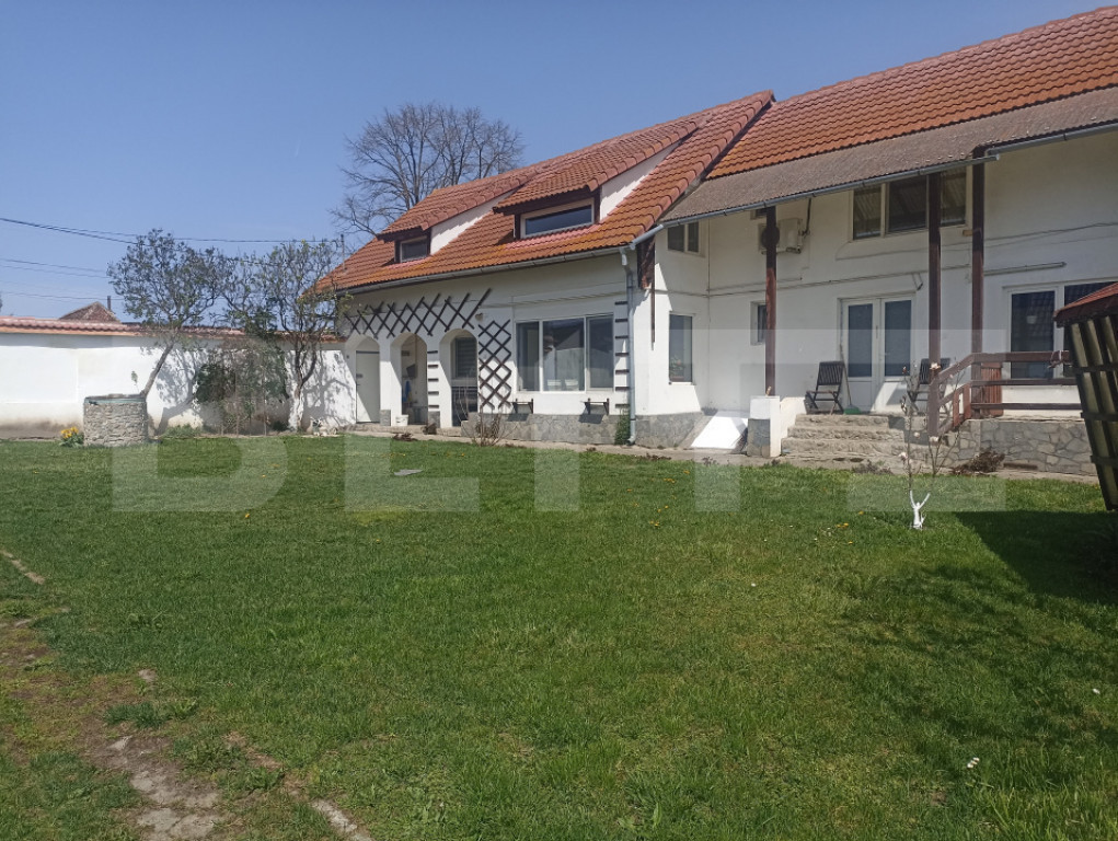 Casă de vânzare cu teren generos – la doar 15 minute de