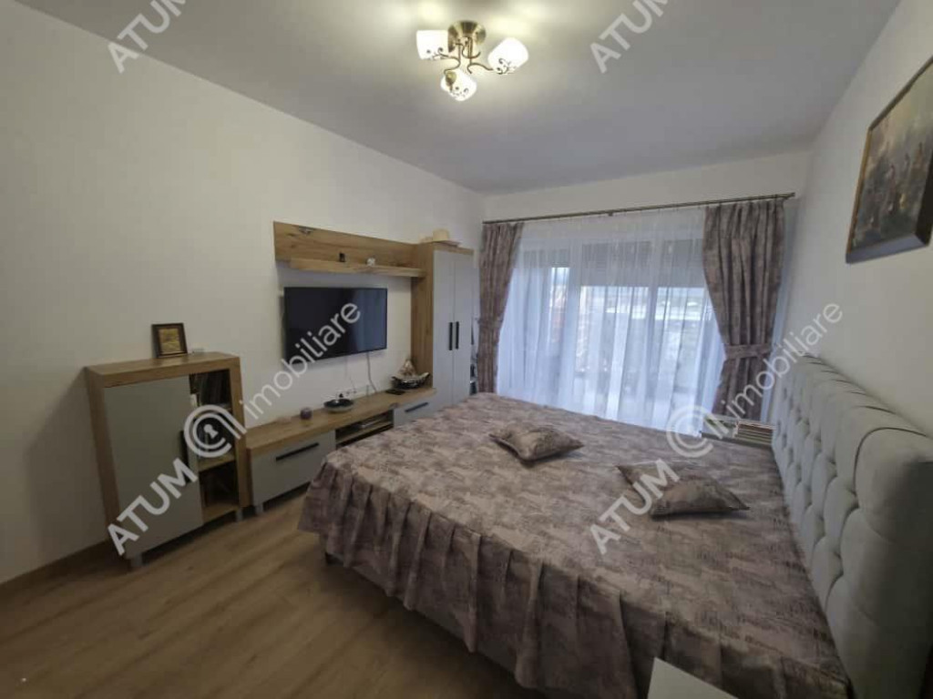 Garsoniera decomandata cu balcon si parcare in zona DaVinci