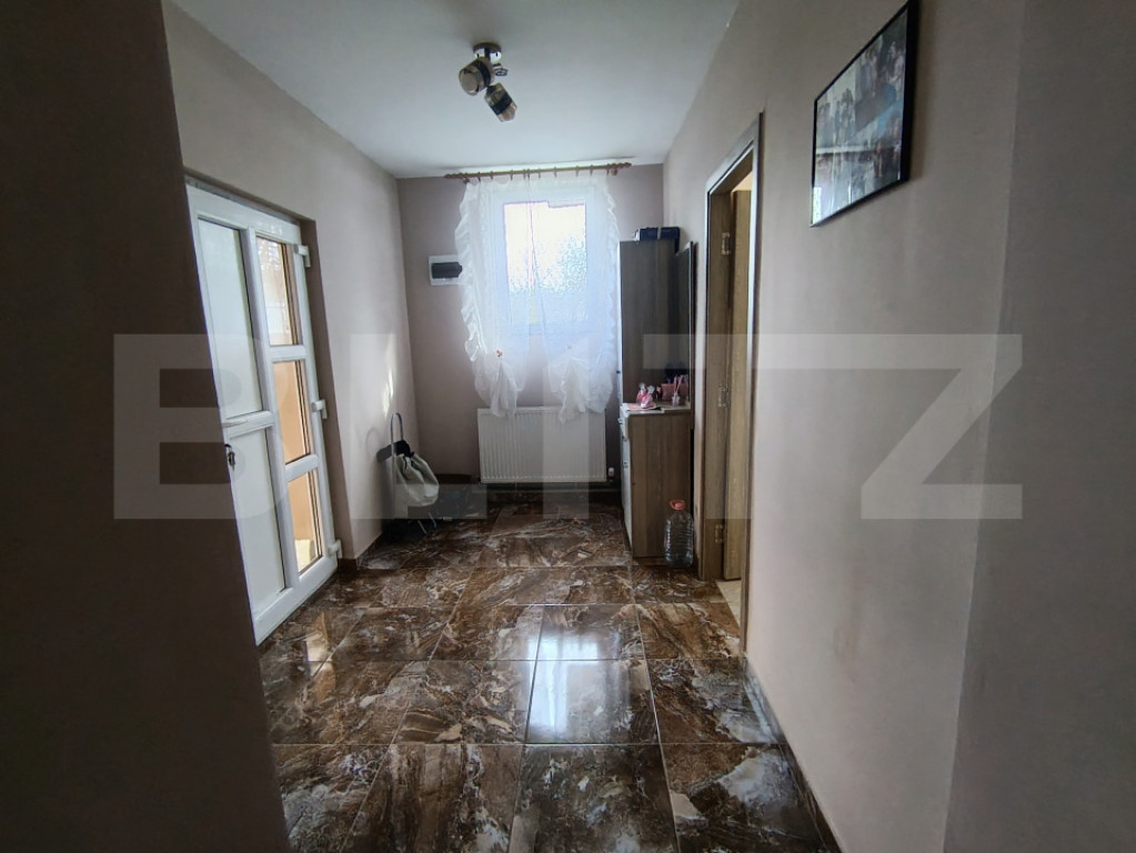 Casa cu 3 camere,baie, bucatarie, teren 500 mp