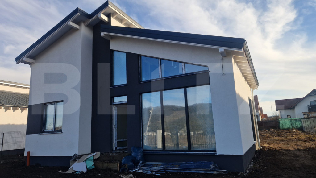 Casa Harman individuala , 712 mp teren , moderna, intabulata