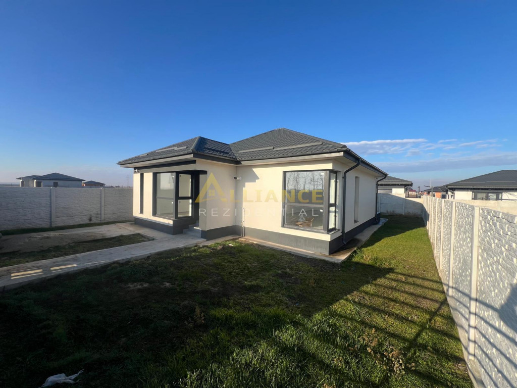 Casa de cu 3 camere,2 bai,teren 376mp