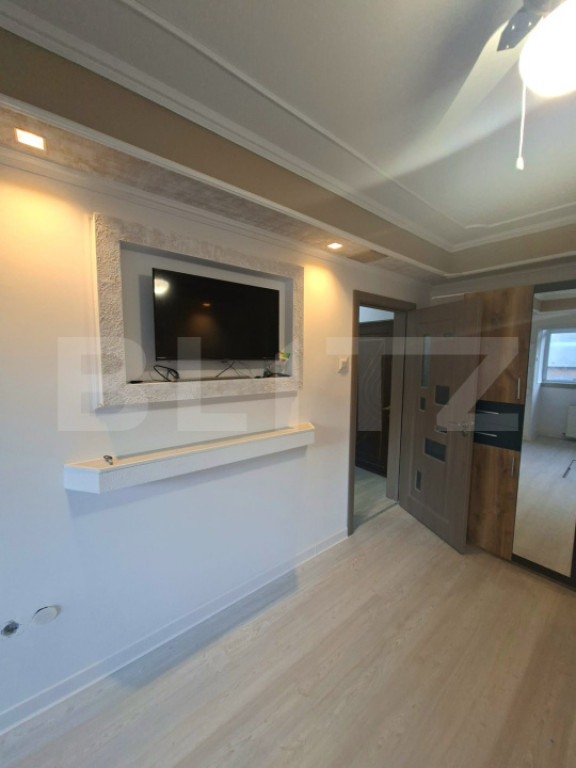 Garsonieră complet renovată de vânzare