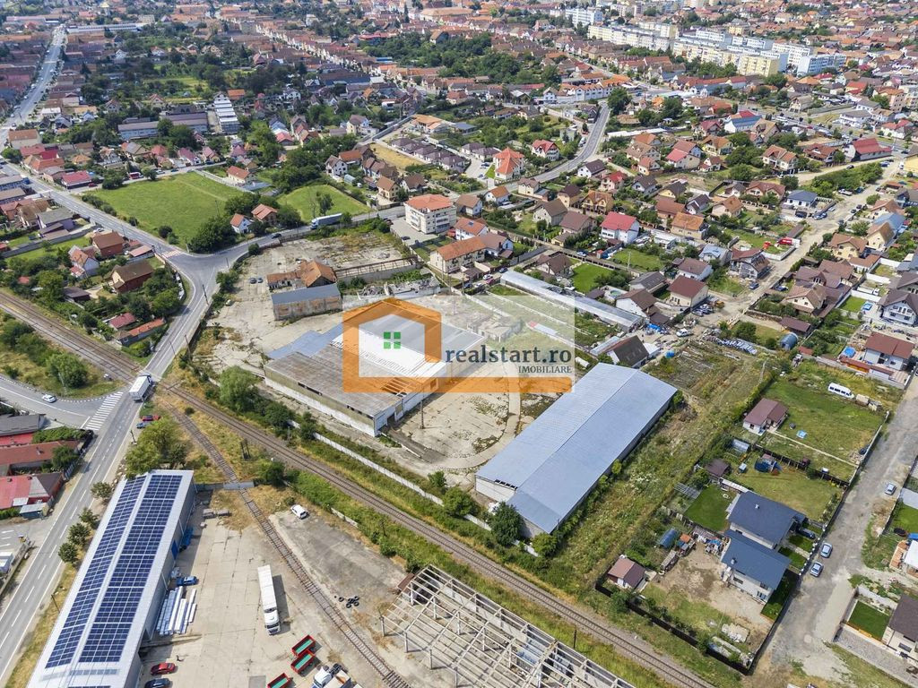 Codlea, Depozite si teren 1,7Ha, 5600mp cladiri, D 155ml ...
