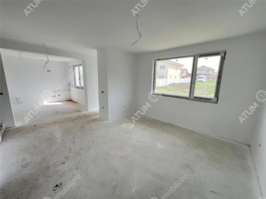 Casa cu 3 camere 2 bai si curte de 170 mp zona Calea Cisnadi
