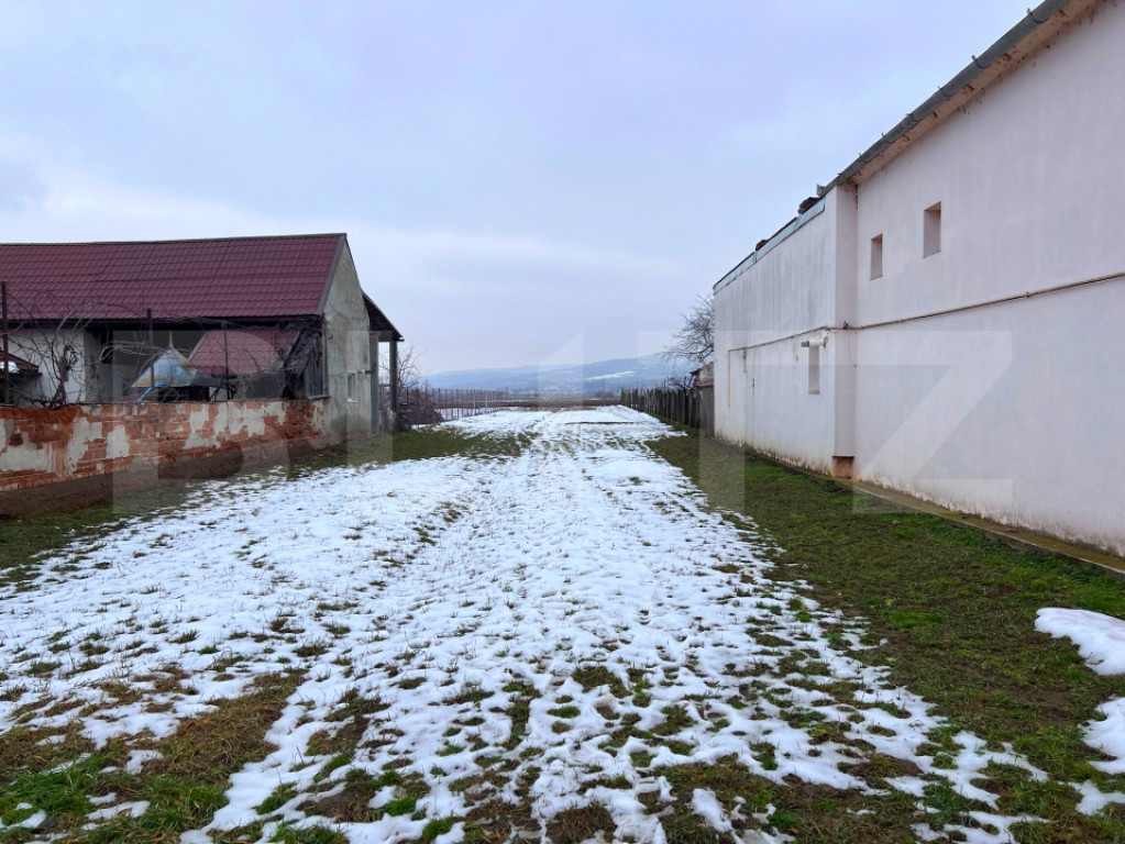 Teren intravilan, 941mp, front 11m, utilitati la strada, Ciu