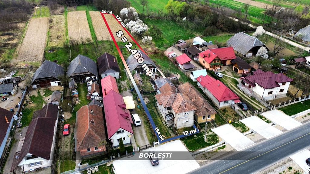 Casă din cărămidă cu teren generos de 2460 mp și ane...