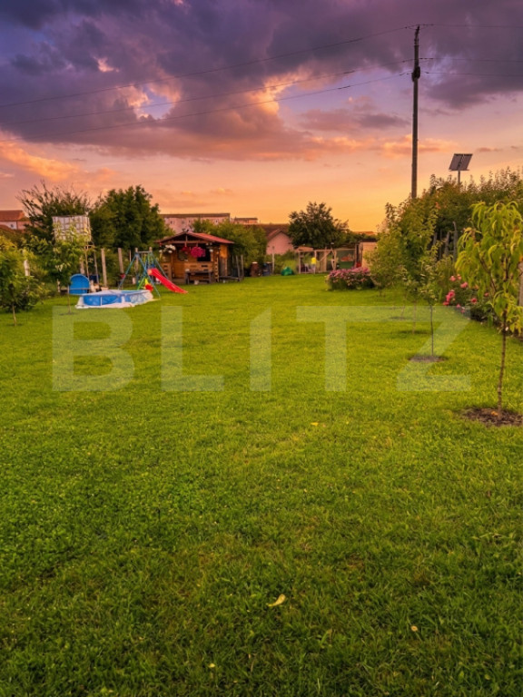 Teren intravilan 595 mp cu cabană și pomi fructiferi, Ampo