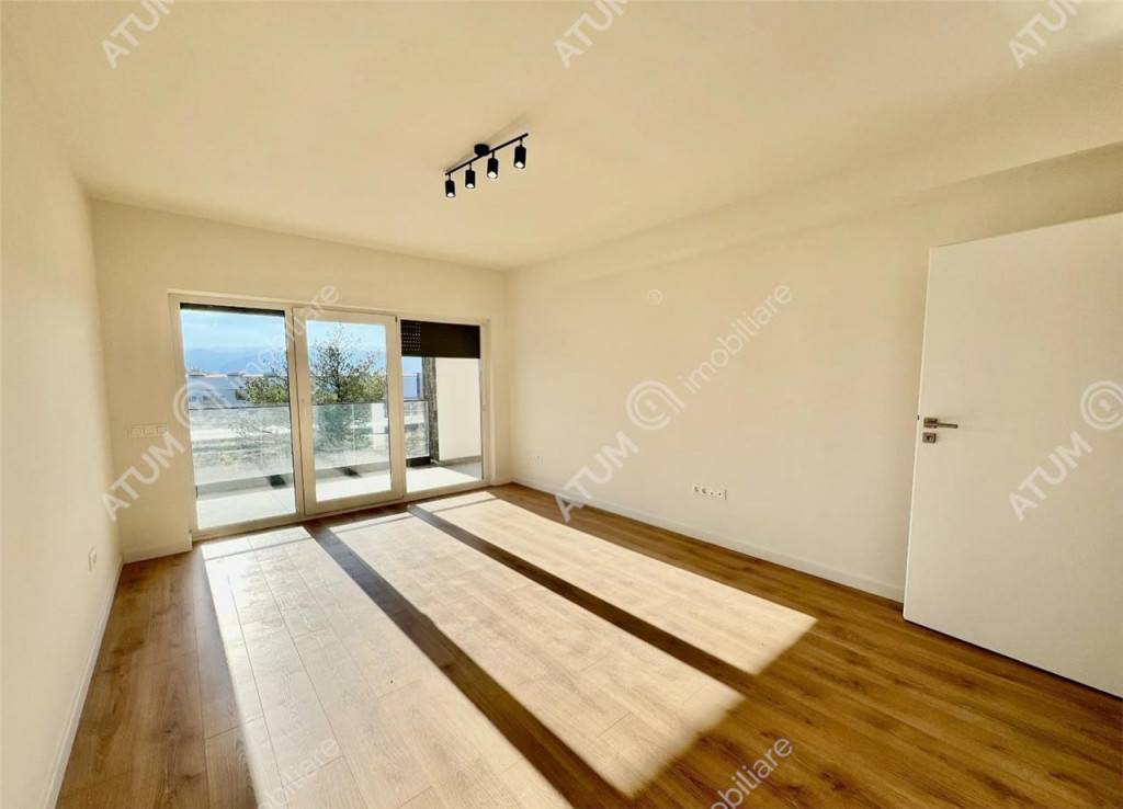 Apartament cu 3 camere 2 bai la alb loc privat de parcare in