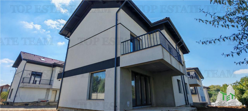 Vila individuala cuplata, in complex rezidential modern, cu