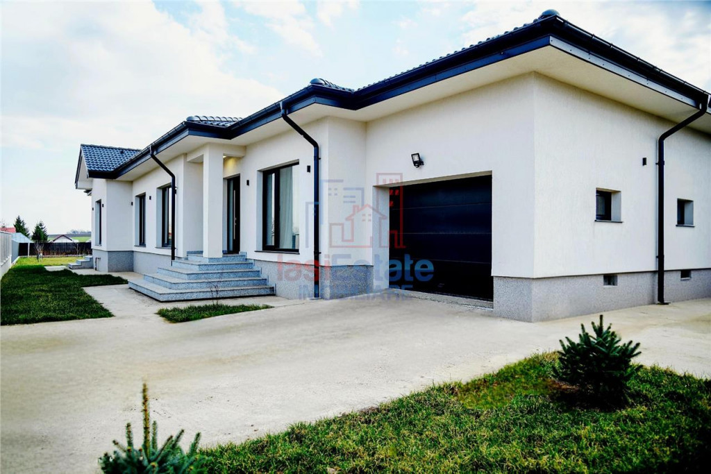 Casa intr-o zona linistita cu garaj si teren-1091 mp