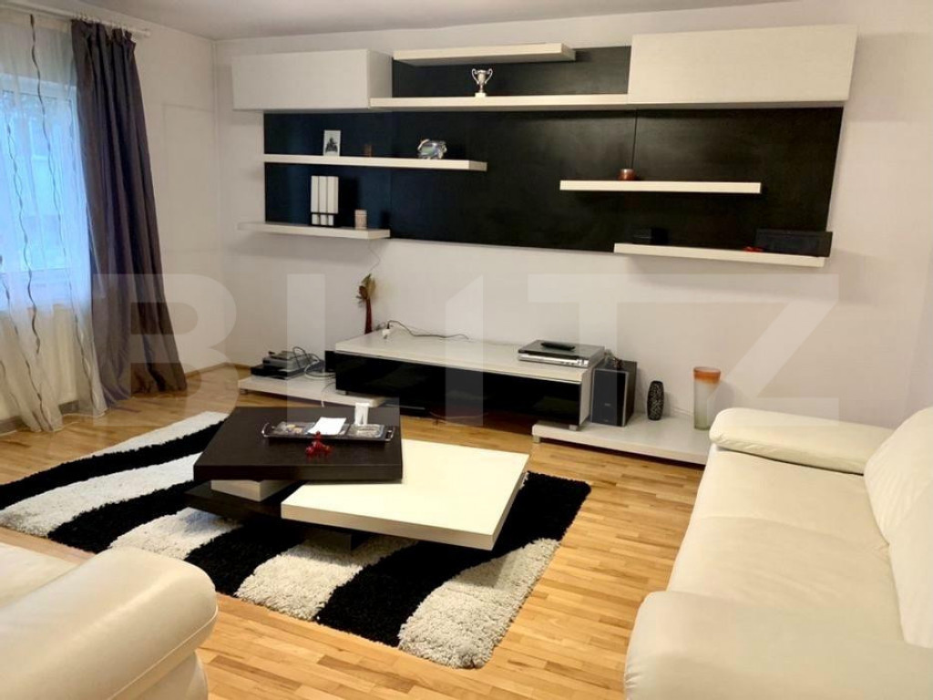 Apartament elegant cu finisaje premium si 2 parcari in Manas