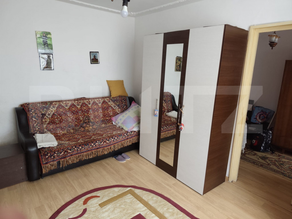 2 camere, etaj 1/4, centrală proprie – oportunitate de re