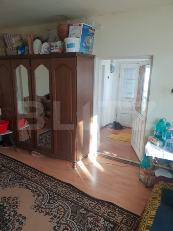 Casă cu 3 dormitoare și teren generos de 96 ari, aproape d