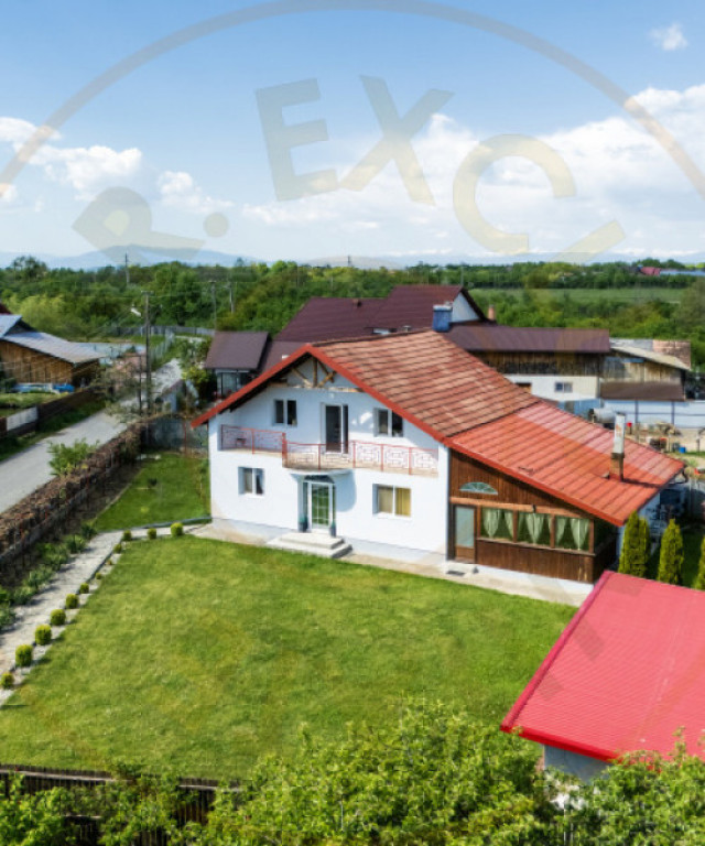 Casa cu teren generos si gradina spectaculoasa – Comuna Cu