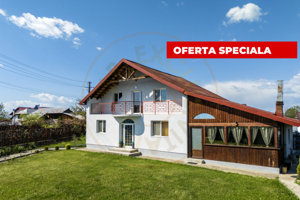 Casa cu teren generos si gradina spectaculoasa – Comuna Cu