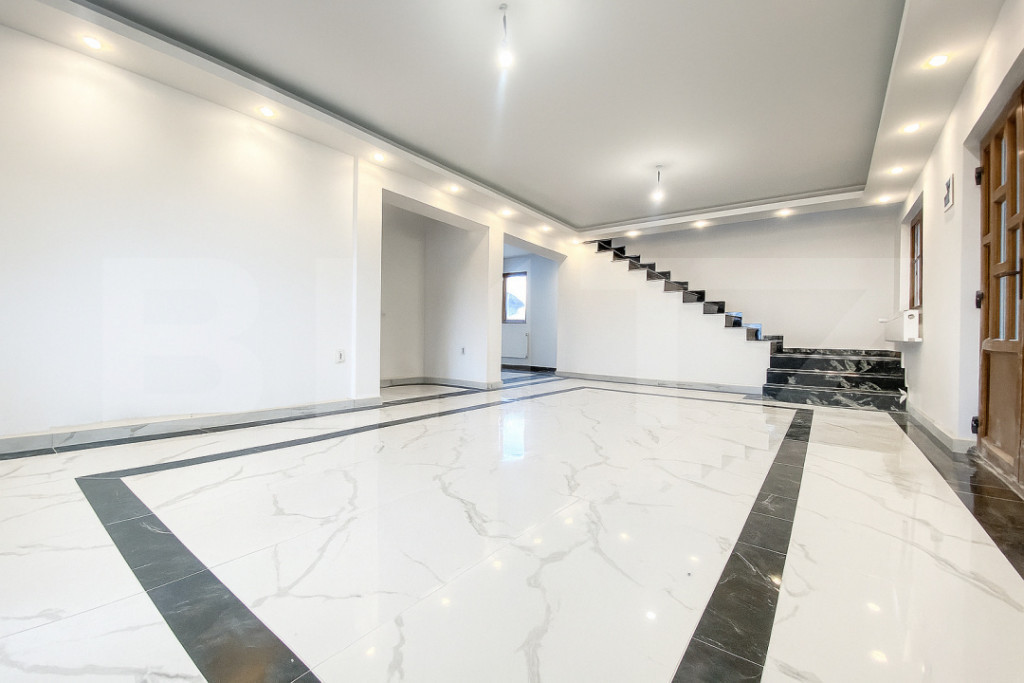 Casa moderna cu 210 mp utili, terase inchise si finisaje pre