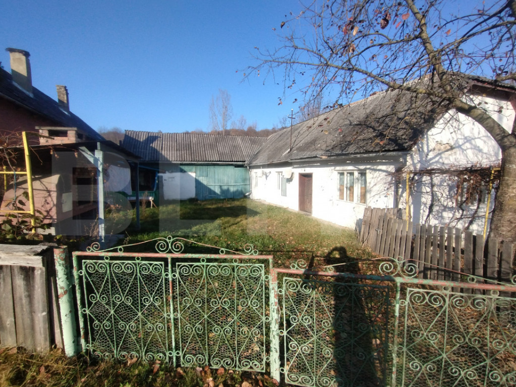 Casa 2 camere 70mp,+teren intravilan 1646 mp,zona Comunei Si