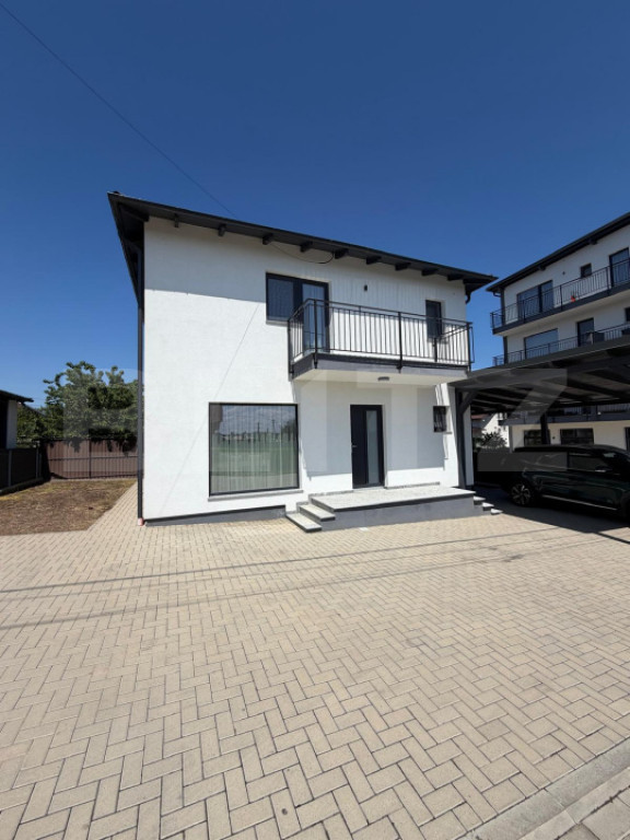Casa moderna, 4 camere, 119 mp utili cu car port auto, zona