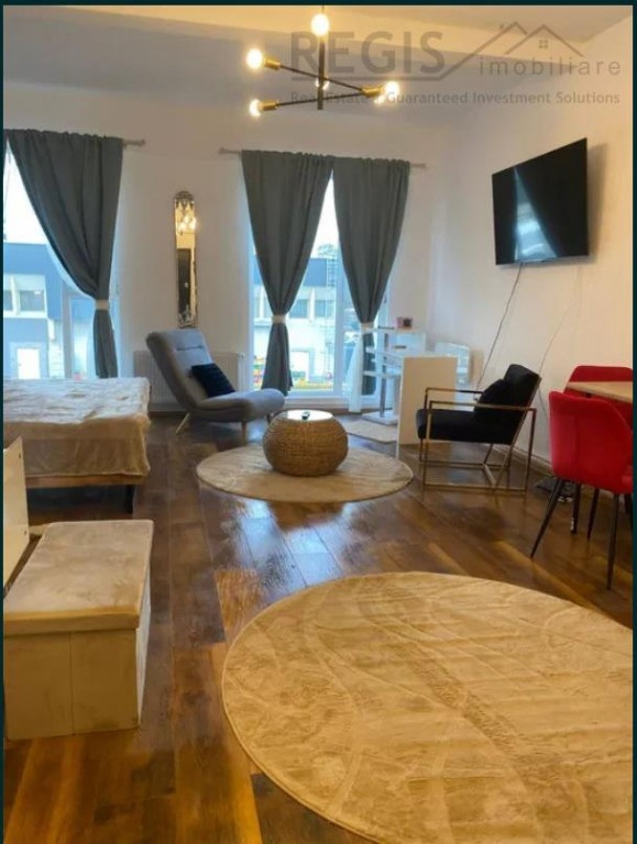 Garsoniera moderna si spatioasa