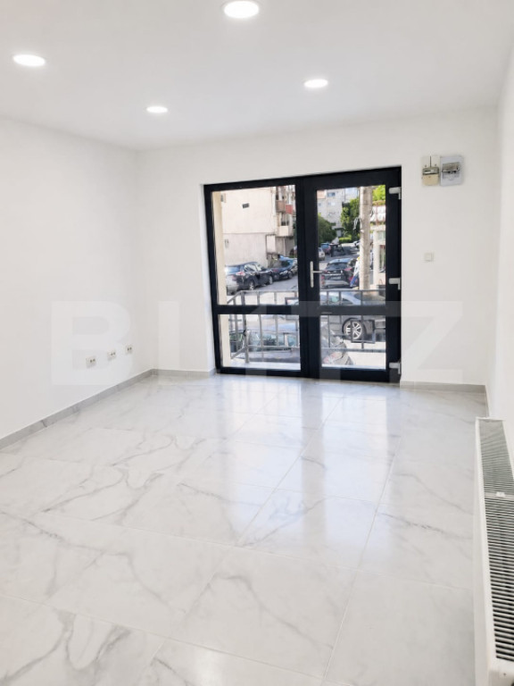 Apartament 2 camere, parter înalt +spatiu comercial investi
