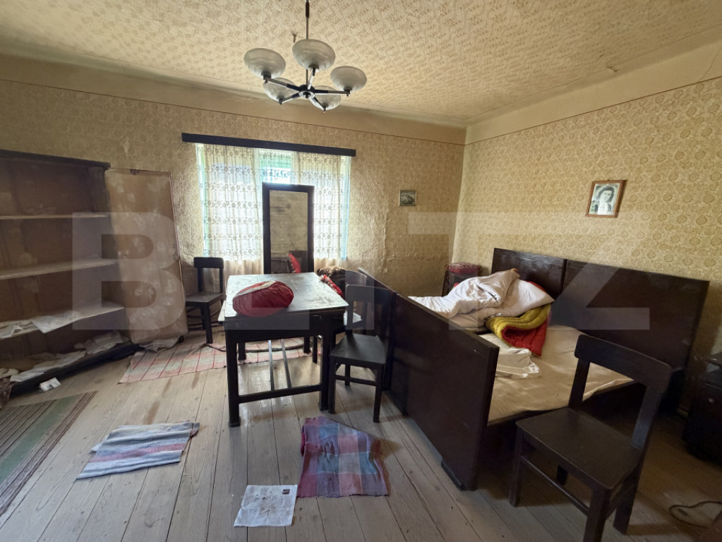 Casă cu 3 camere și un teren în suprafață de 1900 mp