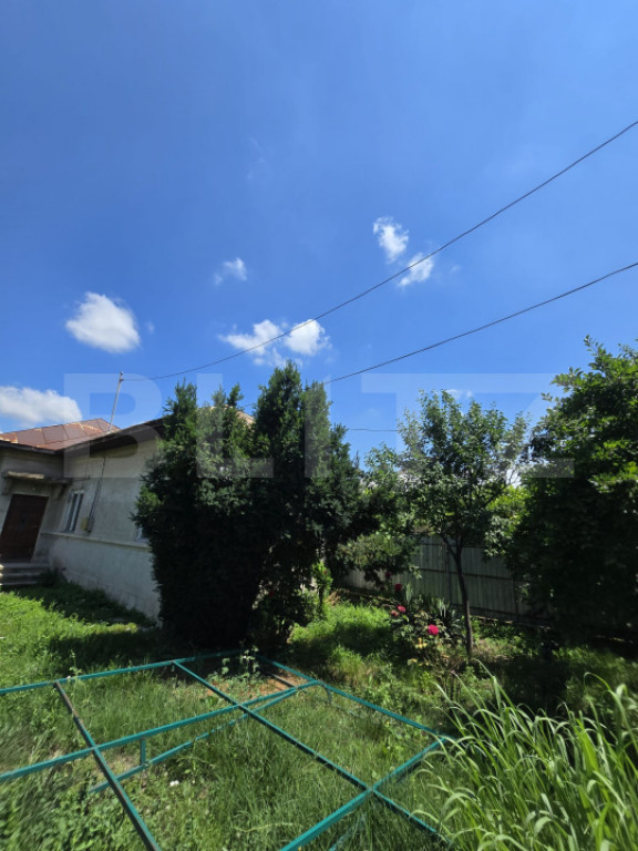 Casă 65 mp, teren de 1.500 mp, zona Titu