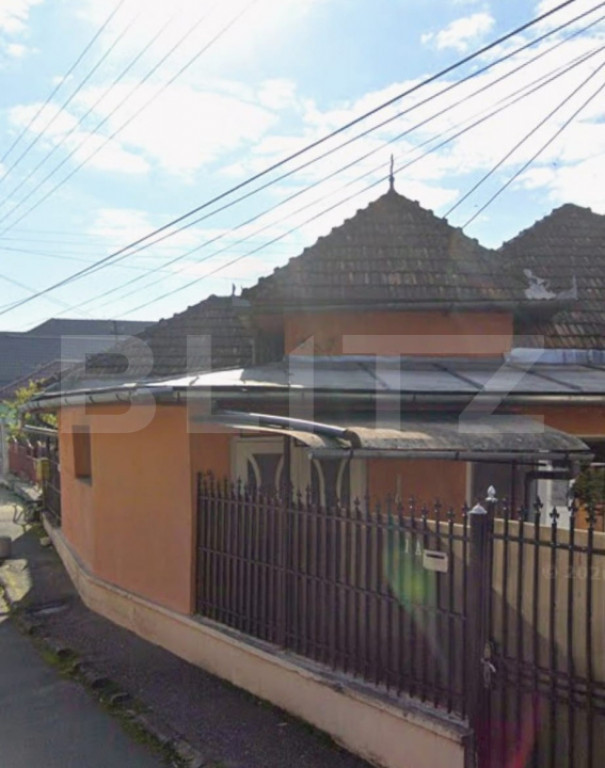 Casă cochetă cu curte proprie în Gherla – confort și l