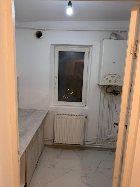 Apartament recent renovat cu centrala proprie parter zona Sa