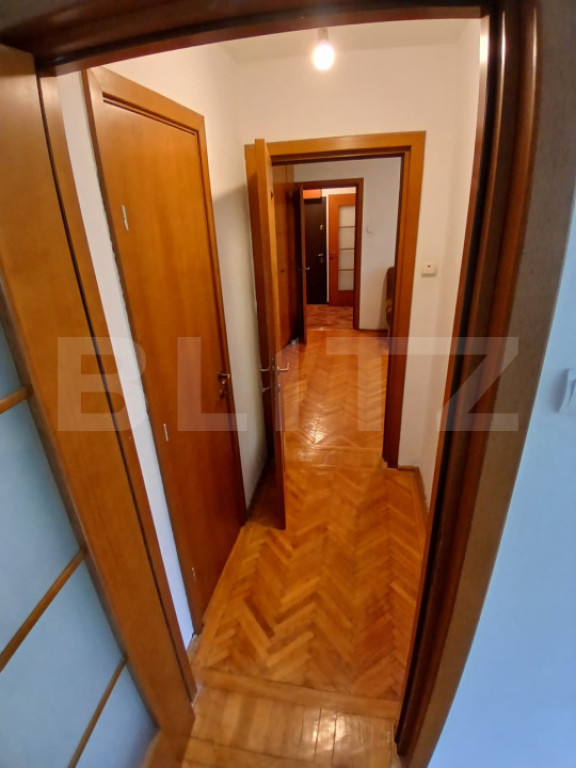 Apartament cu 2 camere, semidecomandat, în zonă liniștit?