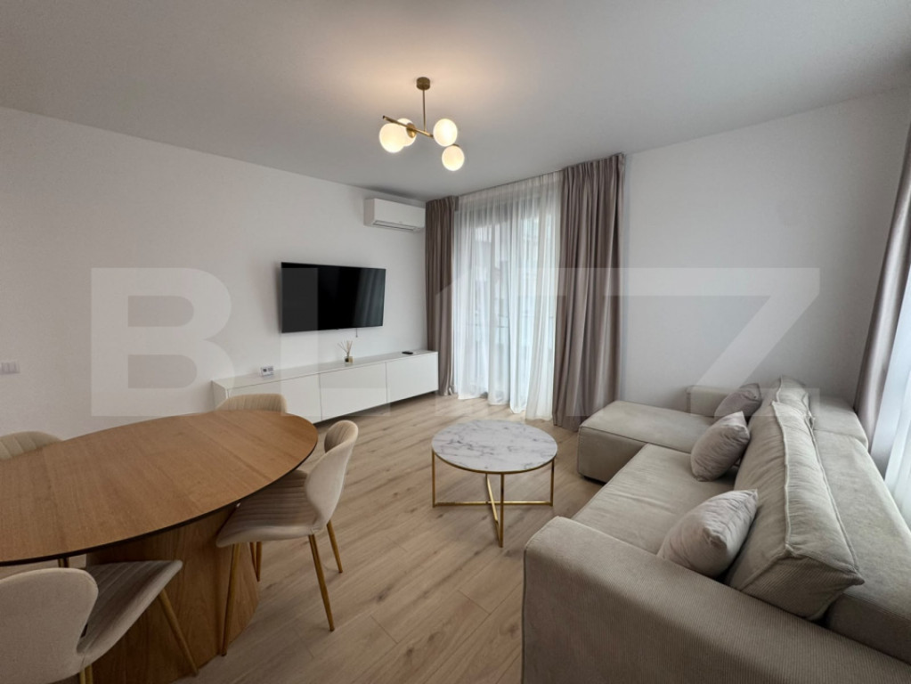 Apartament cu 2 camere, modern, loc de parcare– zona Într