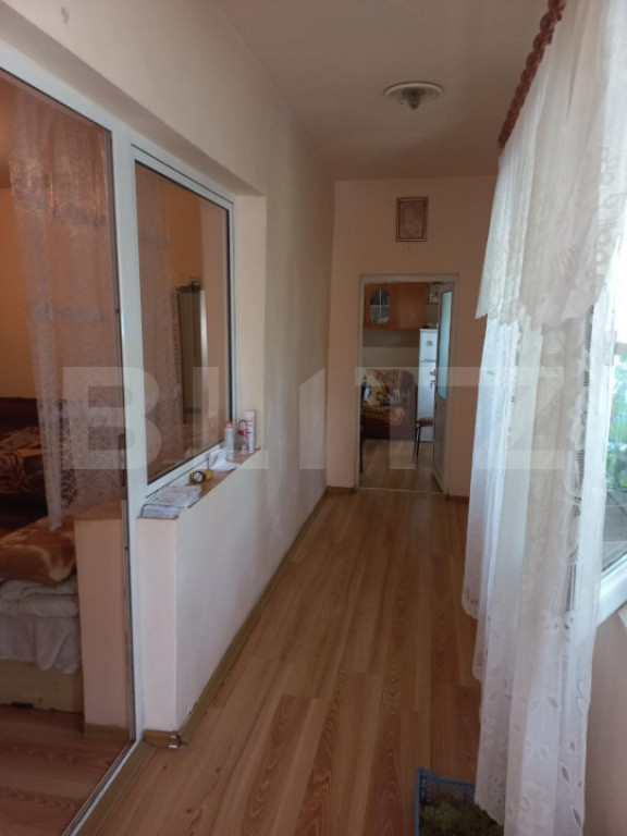 Casă 70 mp, 3 camere , bucatarie, baie , teren 1270 mp, Pr